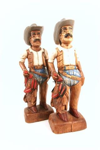 Cowboy figurines, carved wood