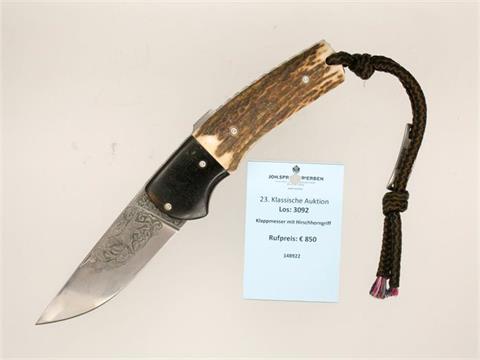 folding knife with stag antler handle